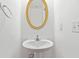 Well-lit powder room with pedestal sink, gold-framed mirror, and classic fixtures for guests at 4264 Parks Ridge Dr, Snellville, GA 30039