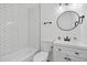 Modern bathroom featuring a shower and stylish vanity with sleek, black fixtures at 799 Kennesaw Dr, Forest Park, GA 30297