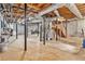 Spacious unfinished basement with concrete floors, open ceiling, and metal support beams ready for customization at 1757 Colonial South Sw Dr, Conyers, GA 30094