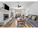 Inviting living room with stylish furnishings and fireplace at 1757 Colonial South Sw Dr, Conyers, GA 30094