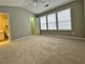 Bedroom featuring a walk-in closet and large windows for natural light at 4645 Valais Ct # 121, Alpharetta, GA 30022