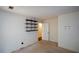 An empty bedroom with built-in shelving and light walls at 154 Weatherly Way, Alpharetta, GA 30009
