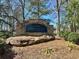 Stone entrance sign for Vantage Point Community with mature landscaping at 154 Weatherly Way, Alpharetta, GA 30009