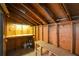 Unfinished storage area with shelving, workbench, and ample space for projects or storage at 154 Weatherly Way, Alpharetta, GA 30009
