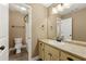 Bathroom featuring tiled floor, single sink, and a tub shower combo at 240 Indian Creek Rd, Locust Grove, GA 30248