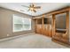Neutral bedroom with large window and unique built-in play area providing a cozy retreat at 240 Indian Creek Rd, Locust Grove, GA 30248