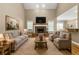 Spacious living room with vaulted ceilings, stone fireplace and hardwood floors at 240 Indian Creek Rd, Locust Grove, GA 30248