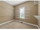 Spacious walk-in closet with carpet and installed shelving providing ample storage for an organized wardrobe at 240 Indian Creek Rd, Locust Grove, GA 30248