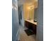 Bathroom with tile floors and double sinks at 5009 Duval Point Sw Way, Snellville, GA 30039