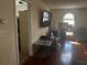 Bedroom showing hardwood floors, with views to the closet and lots of light from the arched windows at 5009 Duval Point Sw Way, Snellville, GA 30039