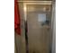 Shower with glass door and tile surround at 5009 Duval Point Sw Way, Snellville, GA 30039