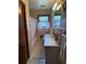 The bathroom features a single sink and shower and tub combo at 6957 Mason Creek Rd, Douglasville, GA 30135
