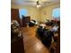 Spacious bedroom with hardwood flooring and a ceiling fan at 6957 Mason Creek Rd, Douglasville, GA 30135