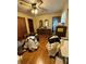 Bedroom features hardwood floors and double doors to bathroom at 6957 Mason Creek Rd, Douglasville, GA 30135