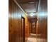 Hallway features wood paneling at 6957 Mason Creek Rd, Douglasville, GA 30135