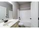 Bathroom featuring a bright white shower and tub, vanity, and toilet at 1209 Richmond Rdg, Loganville, GA 30052