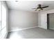 Spacious bedroom features neutral carpet, one window, ceiling fan, and a closet at 1209 Richmond Rdg, Loganville, GA 30052