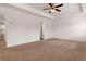 Spacious bedroom with neutral carpet, recessed lighting, and tray ceiling at 121 Shoals Bridge Rd, Acworth, GA 30102