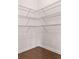 Walk-in closet with wire shelving and hardwood floors at 121 Shoals Bridge Rd, Acworth, GA 30102