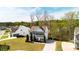 This home has a well-maintained lawn, landscaping, and a traditional exterior at 121 Shoals Bridge Rd, Acworth, GA 30102
