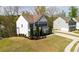 Beautiful home featuring a lush lawn, manicured landscaping, and a long driveway for ample parking at 121 Shoals Bridge Rd, Acworth, GA 30102