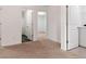 View of hallway with access to a bathroom, bedroom, and laundry room at 121 Shoals Bridge Rd, Acworth, GA 30102