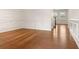 Open hallway featuring beautiful hardwood floors and decorative wall trim at 121 Shoals Bridge Rd, Acworth, GA 30102