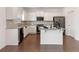 Modern kitchen with white cabinets, granite countertops, and stainless steel appliances at 121 Shoals Bridge Rd, Acworth, GA 30102