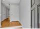 Bright entryway with hardwood floors, white trim, gray walls, and a coat closet at 1735 Peachtree Ne St # 624, Atlanta, GA 30309