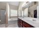 This spacious bathroom features double sinks, tub, and separate shower at 2232 Ann Ln, Lithia Springs, GA 30122
