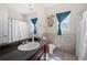 Bathroom featuring stylish tile, vanity, and shower-tub combination at 2232 Ann Ln, Lithia Springs, GA 30122