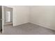 Neutral bedroom with carpet flooring offers ample space for furniture at 2232 Ann Ln, Lithia Springs, GA 30122