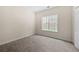 Bright bedroom with neutral walls, carpet flooring, and plenty of natural light at 2232 Ann Ln, Lithia Springs, GA 30122