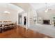 Spacious and open living and dining areas with hardwood floors and a cozy fireplace at 2232 Ann Ln, Lithia Springs, GA 30122