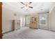 Spacious primary bedroom boasts trey ceilings, natural light, and neutral paint at 2232 Ann Ln, Lithia Springs, GA 30122