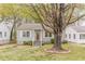 Charming single-story home with a well-manicured lawn and a welcoming front porch at 2460 Constance St, East Point, GA 30344