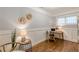 Stylish home office with hardwood floors, wainscoting, and ample natural light at 2460 Constance St, East Point, GA 30344