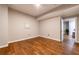 Bedroom featuring hardwood floors and a doorway leading to another room at 2626 Peachtree Nw Rd # 412, Atlanta, GA 30305