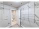 This large walk-in closet includes adjustable shelving and access to the bathroom at 2626 Peachtree Nw Rd # 412, Atlanta, GA 30305