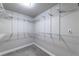 A look inside this large walk-in closet shows adjustable shelving at 2626 Peachtree Nw Rd # 412, Atlanta, GA 30305