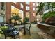 Brick courtyard with an outdoor fountain and seating area, perfect for relaxation at 2626 Peachtree Nw Rd # 412, Atlanta, GA 30305