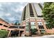 An impressive high-rise building features a brick base and multiple balconies at 2626 Peachtree Nw Rd # 412, Atlanta, GA 30305