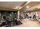 Well-equipped fitness center with treadmills, weights, and exercise machines at 2626 Peachtree Nw Rd # 412, Atlanta, GA 30305