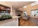 An open concept living room featuring wood floors and plenty of natural light at 2626 Peachtree Nw Rd # 412, Atlanta, GA 30305