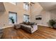 Inviting living room with hardwood floors, gray sofa, and large windows for natural light at 2626 Peachtree Nw Rd # 412, Atlanta, GA 30305