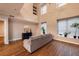 Living room showcasing hardwood floors, high ceilings, and a comfortable gray sofa at 2626 Peachtree Nw Rd # 412, Atlanta, GA 30305