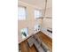 Bright living room featuring hardwood floors, a gray sectional sofa, and modern ceiling fan at 2626 Peachtree Nw Rd # 412, Atlanta, GA 30305