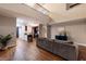 Spacious living room with hardwood floors, high ceilings, and a view of the modern kitchen at 2626 Peachtree Nw Rd # 412, Atlanta, GA 30305