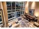 Grand lobby with stylish seating, modern decor, and a large window, offering a bright and welcoming atmosphere at 2626 Peachtree Nw Rd # 412, Atlanta, GA 30305