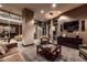 Relaxing lounge boasts a large TV, comfortable seating, and expansive windows, perfect for entertainment and unwinding at 2626 Peachtree Nw Rd # 412, Atlanta, GA 30305